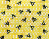 Bumblebees Cotton Print Fabric on a Honey pattern